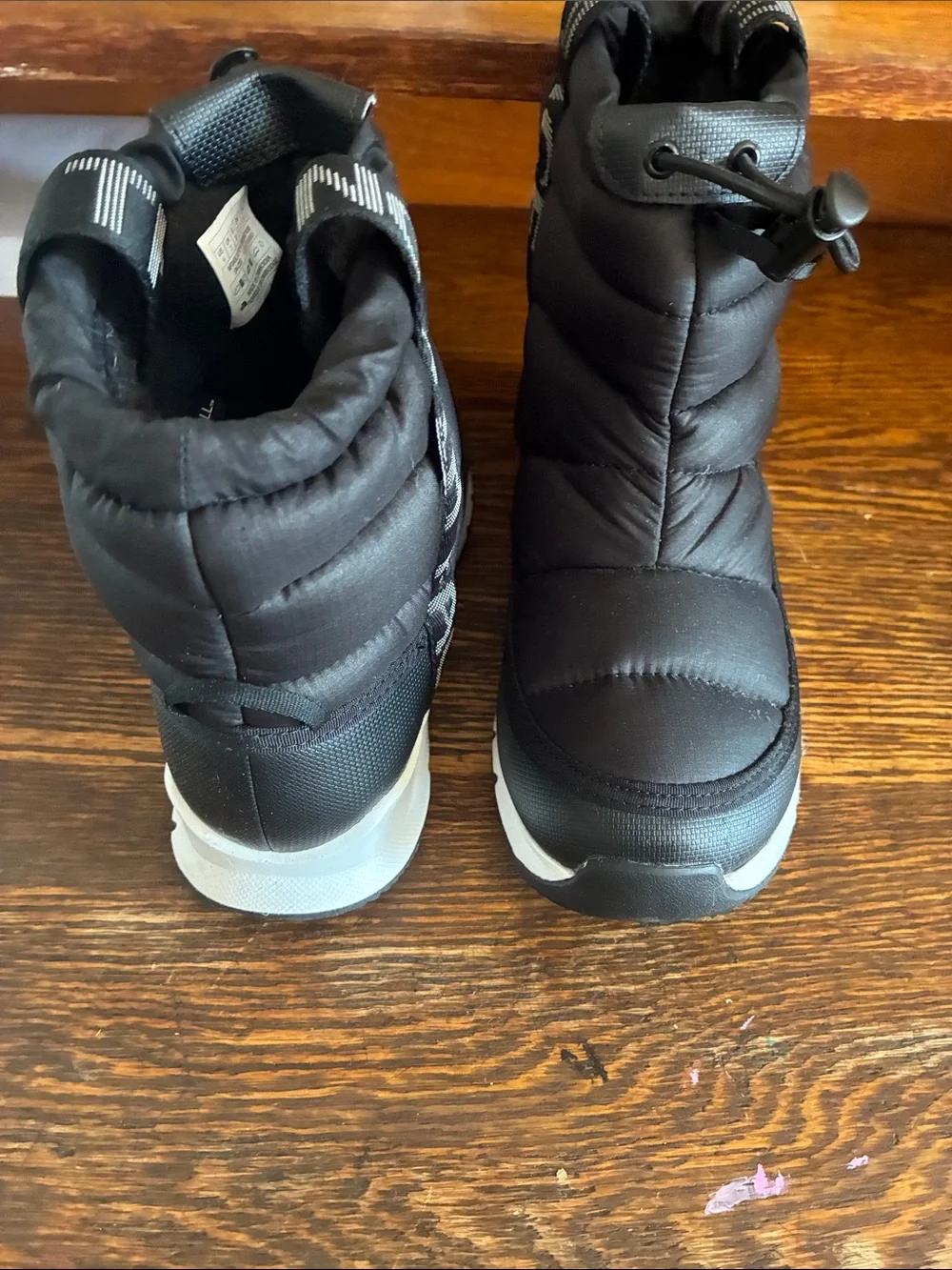 The North Face Kids Black Puffer Snow Boot with Light Gray Sole